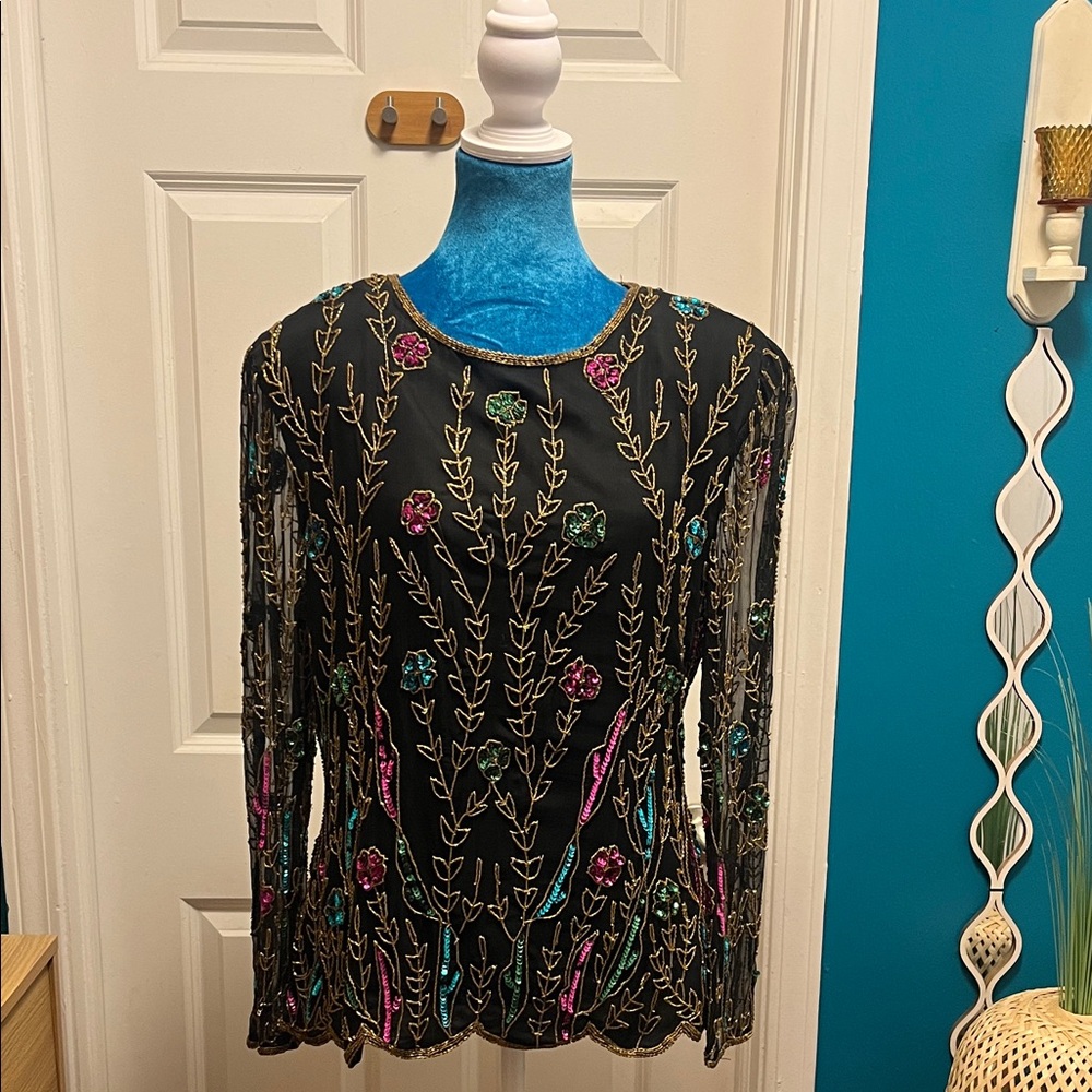 Vintage Chic Floral Embroidered Women's Blouse
Perfect for a formal event!